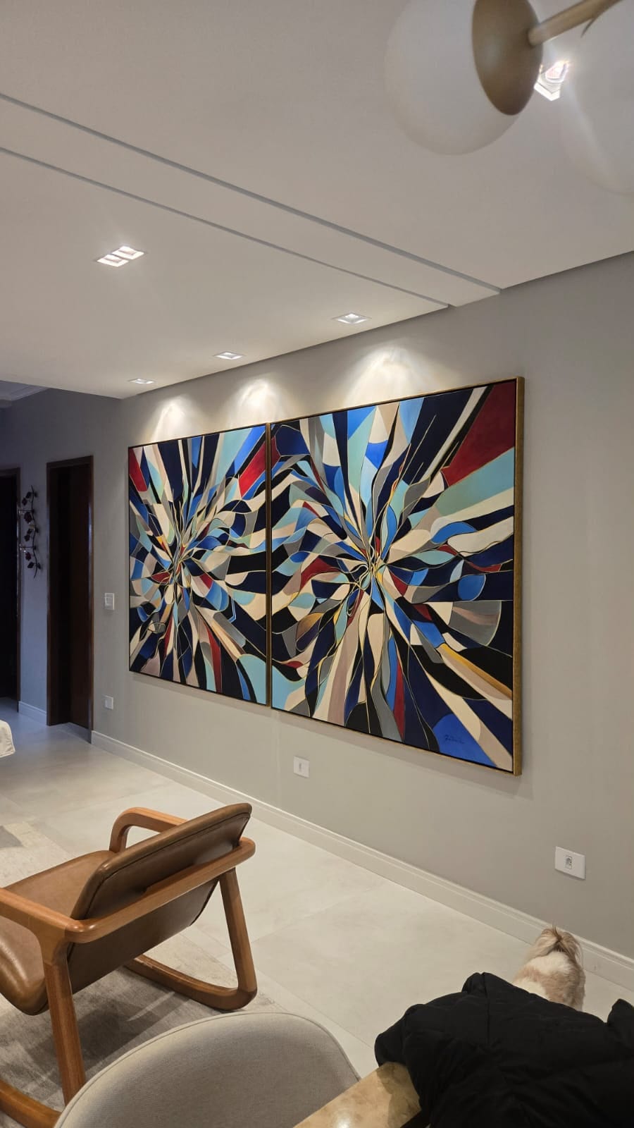 Colors Geometria diptych installed in the hall of a residence